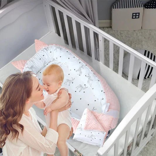 Nid d'ange bebe - réducteur de lit douillet™ - Espacebambin